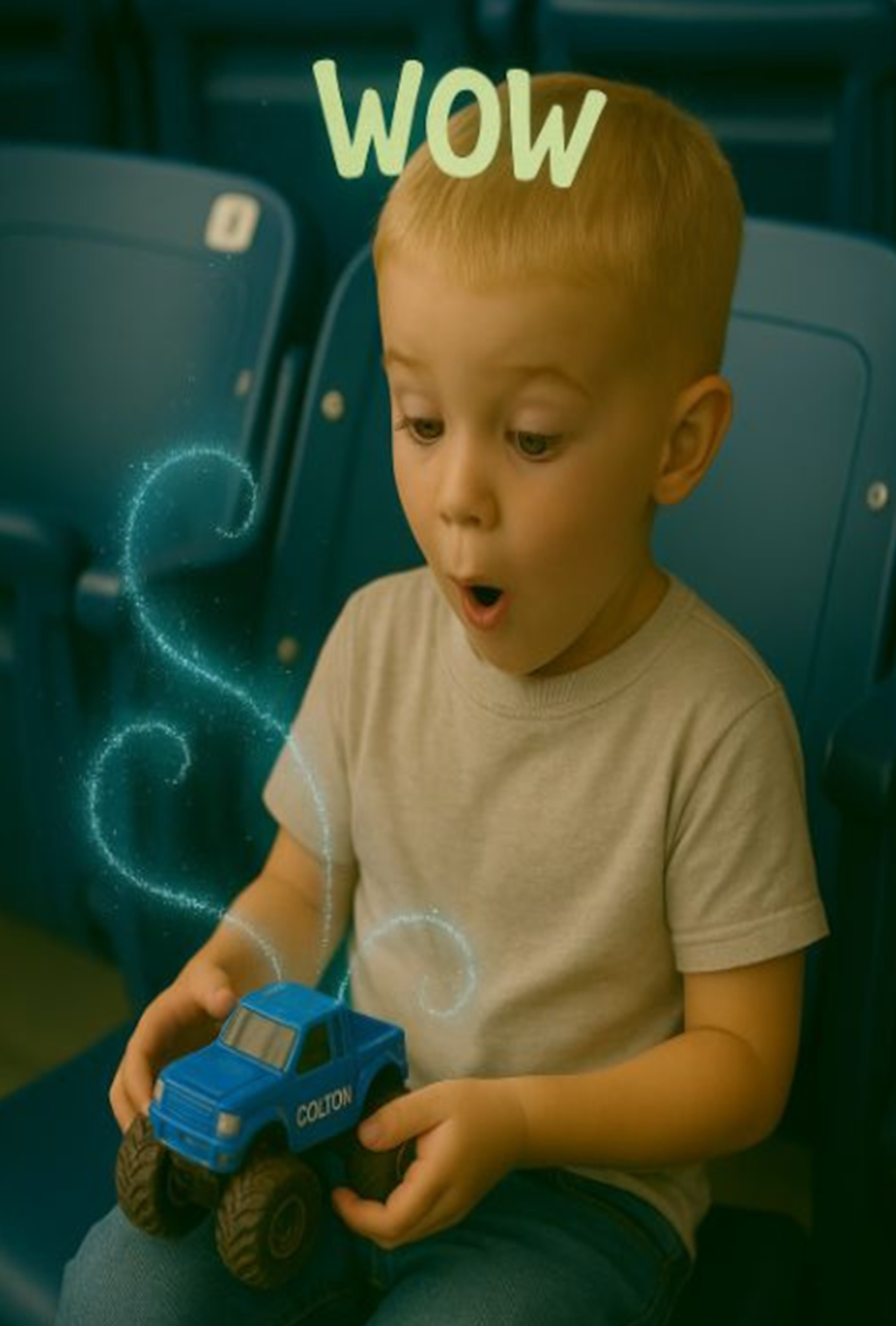 Colton feeling the magic in his toy